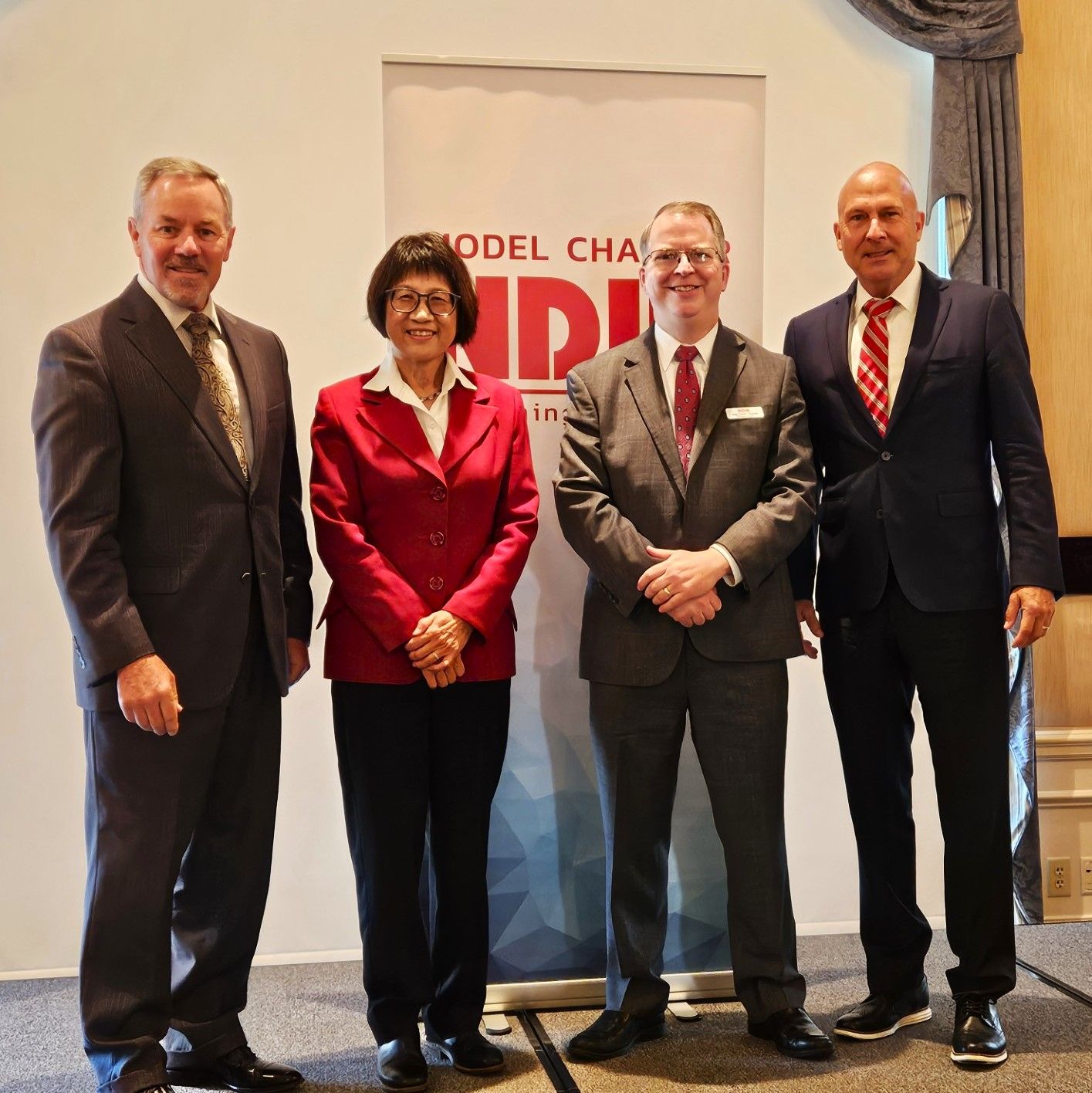 Chapter members pose for a photo at the NDIA DC Chapter's Distinguished Leader Forum